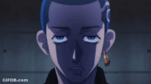 A Close Up Of A Person 'S Face With A Blue Haircut GIF