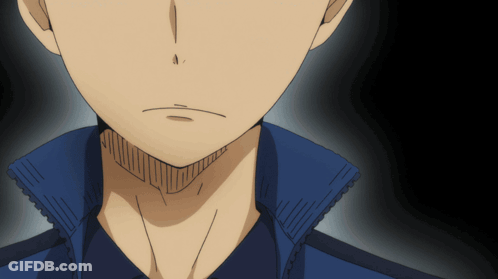 A Close Up Of A Person 'S Face With A Blue Shirt On GIF