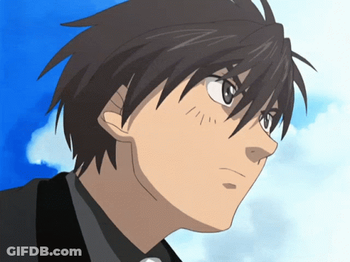 A Close Up Of A Person 'S Face With A Blue Sky Behind Them GIF