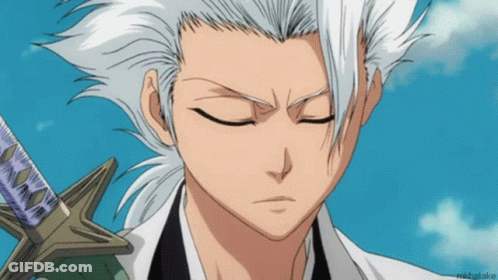 A Close Up Of A Person 'S Face With A Blue Sky In The Background And The Name Michatake On The Bottom GIF