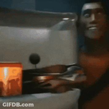 A Close Up Of A Person 'S Face With A Can Of Coca Cola In The Background GIF