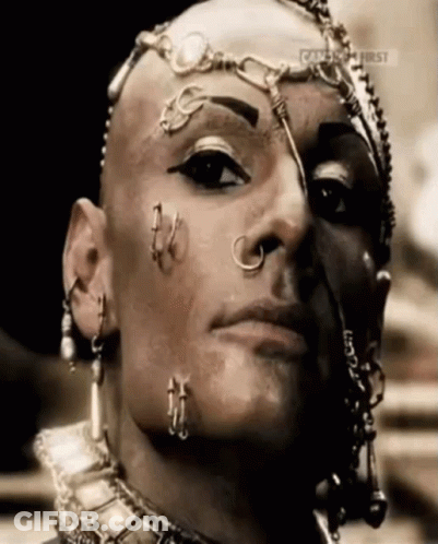A Close Up Of A Person 'S Face With A Caption That Says ' Celebrity First ' GIF