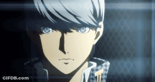 A Close Up Of A Person 'S Face With A Checkered Jacket On GIF