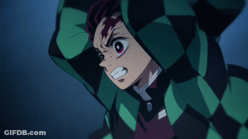 A Close Up Of A Person 'S Face With A Checkered Jacket On GIF