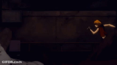 A Close Up Of A Person 'S Face With A Dark Background GIF