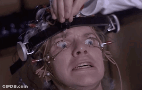 A Close Up Of A Person 'S Face With A Device On Their Head GIF