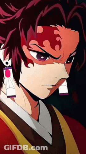 A Close Up Of A Person 'S Face With A Few Earrings GIF