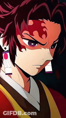 A Close Up Of A Person 'S Face With A Few Earrings On Their Ears GIF