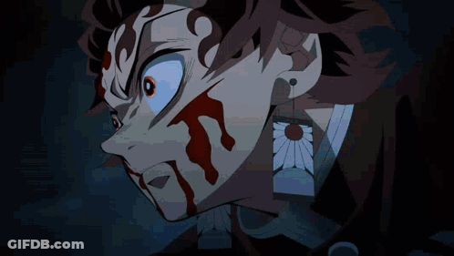 A Close Up Of A Person 'S Face With A Fire Coming Out Of Their Mouth . GIF