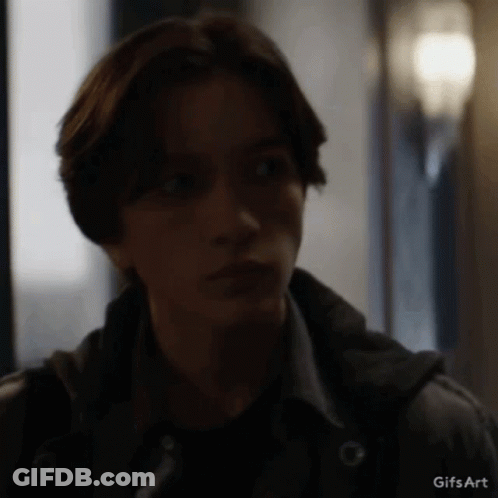 A Close Up Of A Person 'S Face With A Gifs Art Watermark GIF