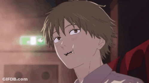 A Close Up Of A Person 'S Face With A Green Light Behind Them GIF