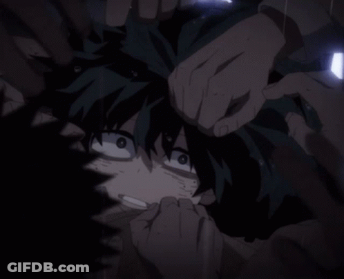 A Close Up Of A Person 'S Face With A Hand Holding It GIF