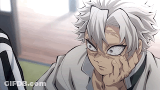 A Close Up Of A Person 'S Face With A Hand On It . GIF