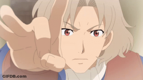 A Close Up Of A Person 'S Face With A Hand Pointing At The Camera GIF