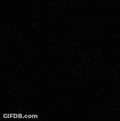 A Close Up Of A Person 'S Face With A Hat On GIF