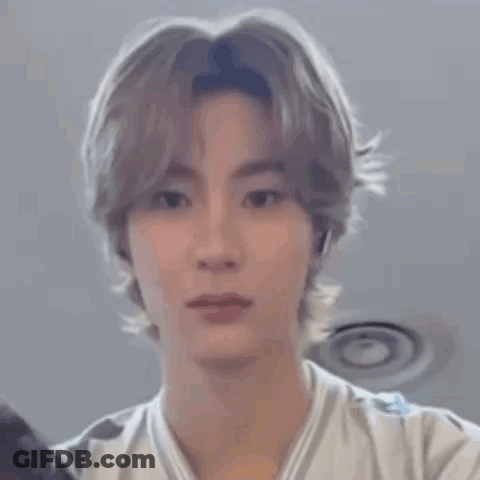 Close Up Of Person's Face With Headband GIF