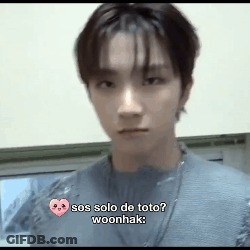 A Close Up Of A Person 'S Face With A Heart And The Words Sos Solo De Toto Woonhak . GIF