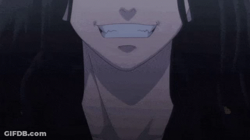 A Close Up Of A Person 'S Face With A Heart Shaped Mouth GIF