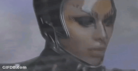 A Close Up Of A Person 'S Face With A Helmet On . GIF