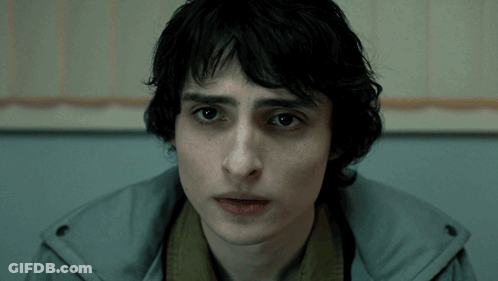 A Close Up Of A Person 'S Face With A Hooded Jacket On GIF