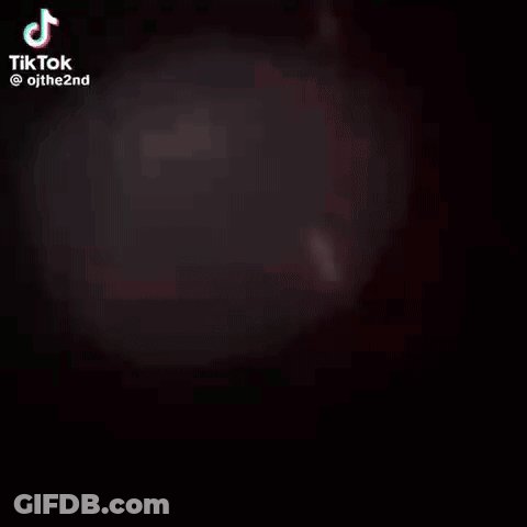 A Close Up Of A Person 'S Face With A Lightning Bolt Coming From It . GIF