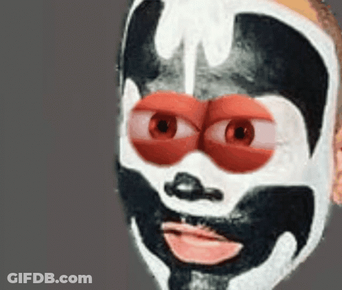 A Close Up Of A Person 'S Face With A Mask On GIF
