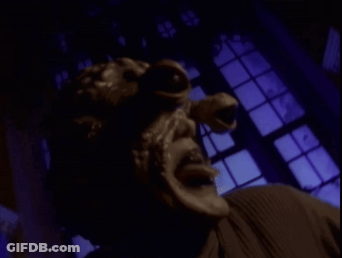 A Close Up Of A Person 'S Face With A Mask On GIF
