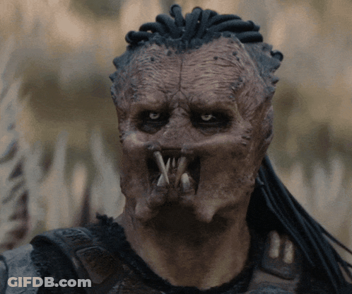 A Close Up Of A Person 'S Face With A Mask On GIF