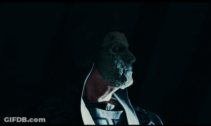 A Close Up Of A Person 'S Face With A Mask On It GIF