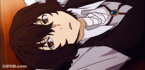 A Close Up Of A Person 'S Face With A Necklace Around Their Neck GIF