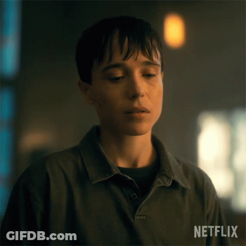 A Close Up Of A Person 'S Face With A Netflix Logo In The Corner . GIF