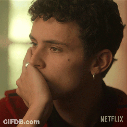 A Close Up Of A Person 'S Face With A Netflix Logo In The Corner GIF