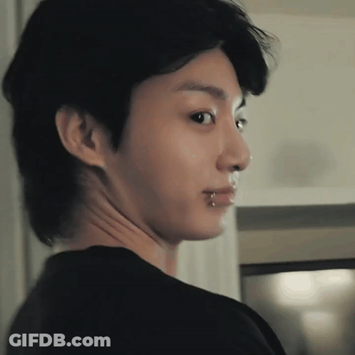 A Close Up Of A Person 'S Face With A Piercing In Their Nose GIF
