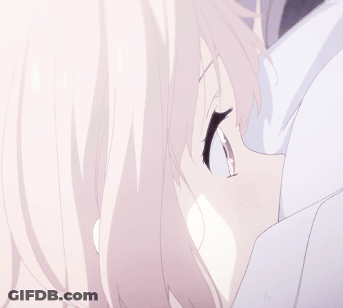 A Close Up Of A Person 'S Face With A Pink Hair GIF
