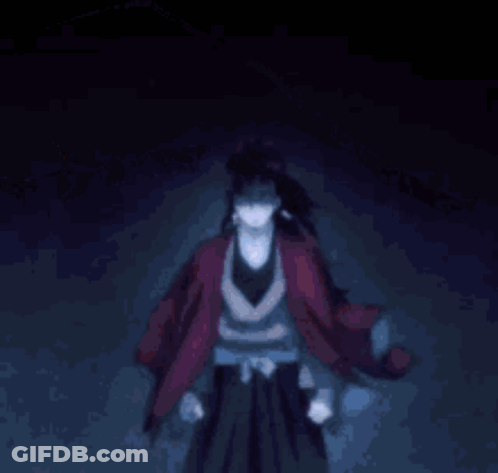 A Close Up Of A Person 'S Face With A Ponytail And Purple Hair . GIF