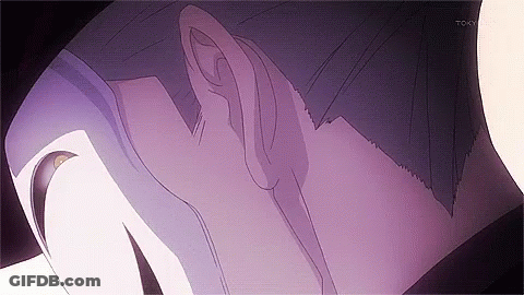 A Close Up Of A Person 'S Face With A Purple Background And A Purple Haircut . GIF