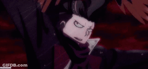 A Close Up Of A Person 'S Face With A Purple Scarf Around Their Neck And Red Eyes . GIF