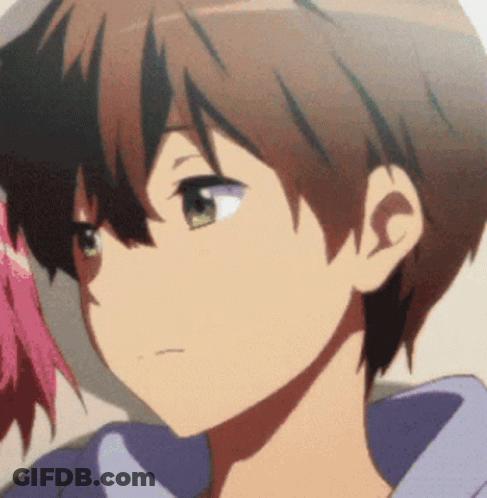 A Close Up Of A Person 'S Face With A Purple Shirt On GIF