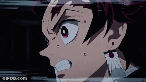 A Close Up Of A Person 'S Face With A Red Eye GIF