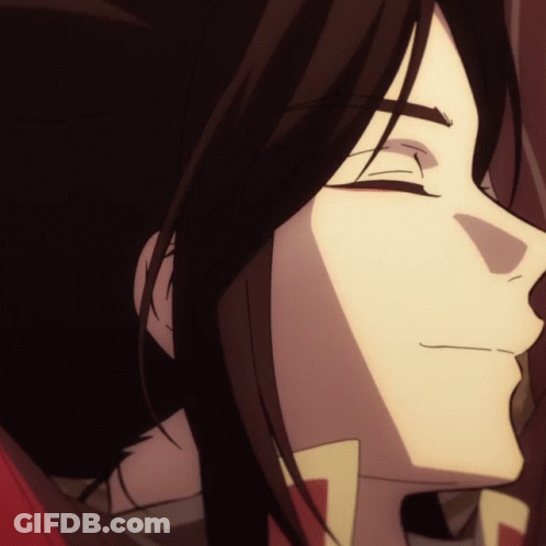 A Close Up Of A Person 'S Face With A Red Eye GIF