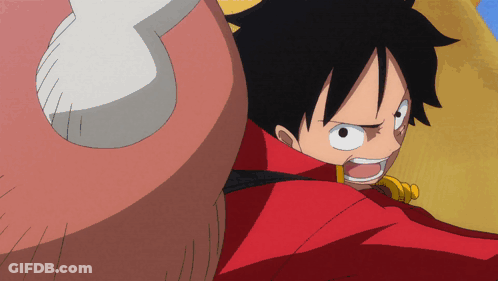 A Close Up Of A Person 'S Face With A Red Jacket On GIF