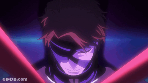 A Close Up Of A Person 'S Face With A Red Light Behind Them GIF