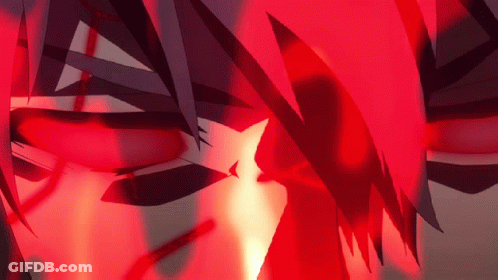 A Close Up Of A Person 'S Face With A Red Light Coming Out Of It GIF
