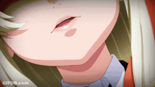 A Close Up Of A Person 'S Face With A Red Lip GIF