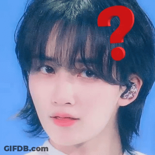 A Close Up Of A Person 'S Face With A Red Question Mark On It . GIF