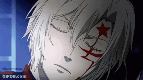 A Close Up Of A Person 'S Face With A Red Star On It And The Word Wolf On The Bottom GIF
