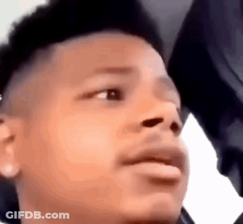 A Close Up Of A Person 'S Face With A Serious Look On His Face . GIF