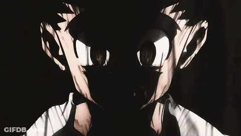 A Close Up Of A Person 'S Face With A Shadow Of A Person Behind Them . GIF