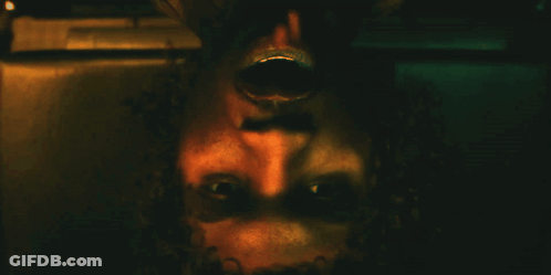 A Close Up Of A Person 'S Face With A Shadow On It GIF