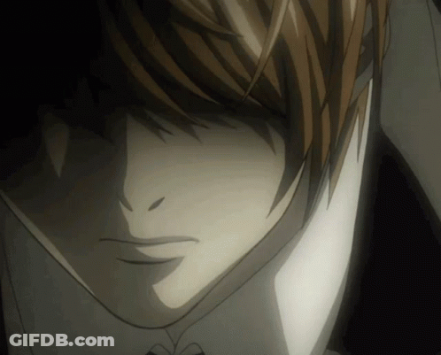 A Close Up Of A Person 'S Face With A Shadow On It GIF